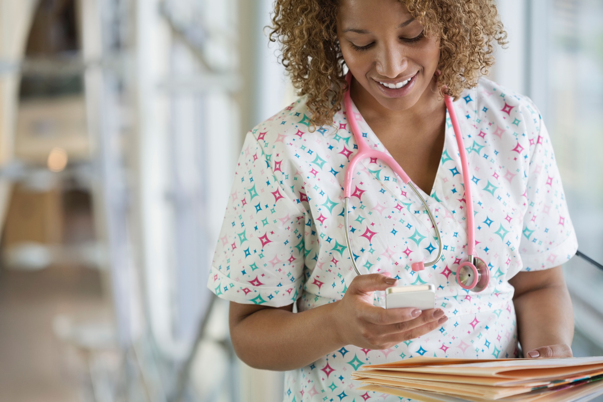 Healthcare professional using a mobile device